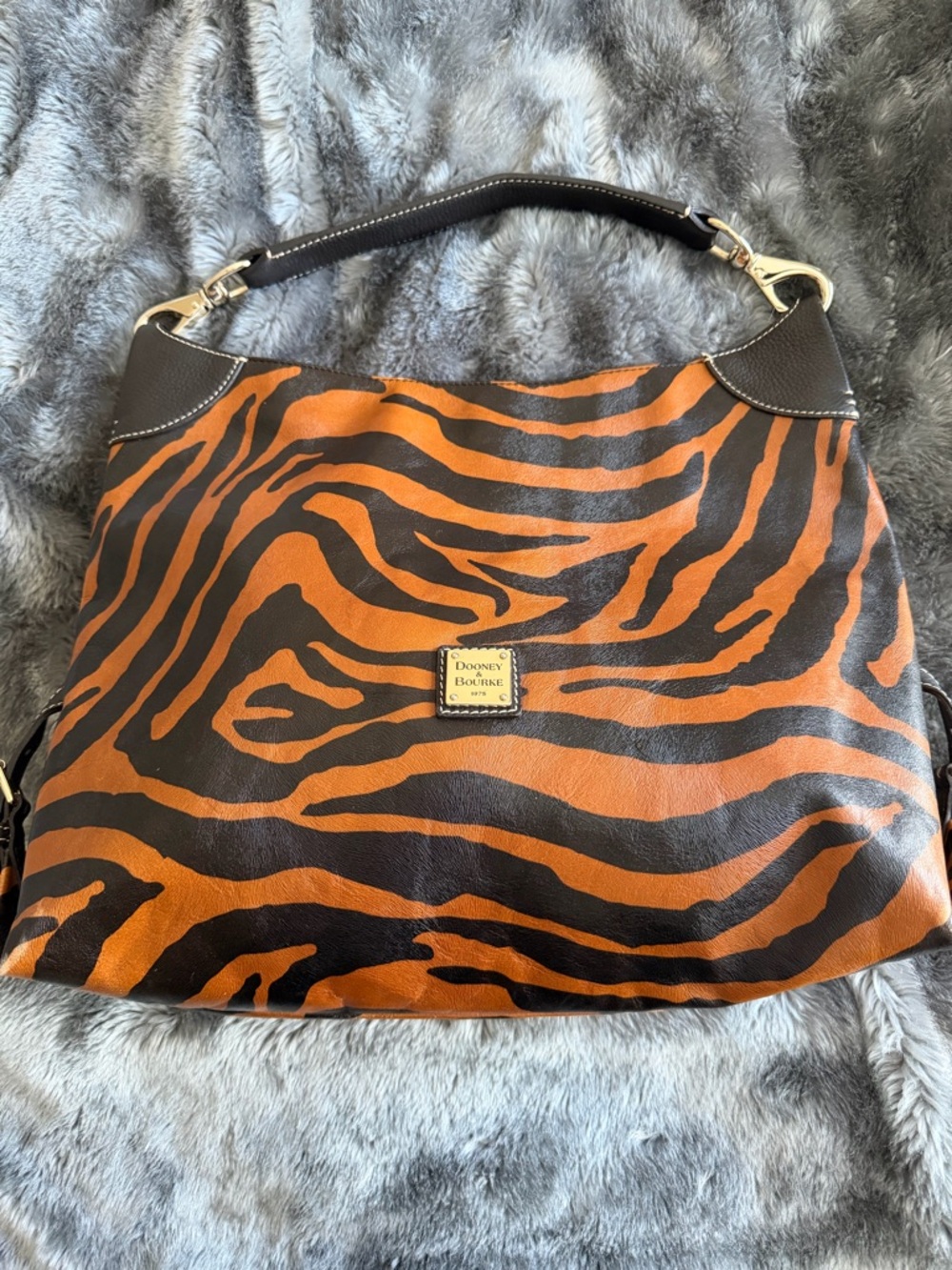 Dooney and Bourke tiger print leather shoulder bag